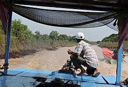 Motoring out to the floating village